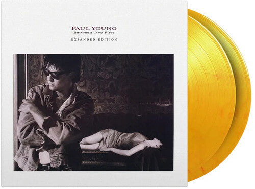 Paul Young - Between Two Fires - Limited & Expanded 180-Gram Flame Colored Vinyl